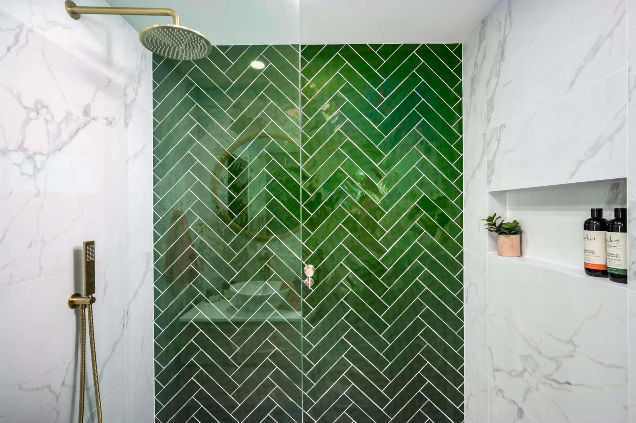 bath and shower are merged into one giant, tiled area