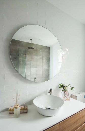 In A Small Bathroom Renovation Use Mirrors For Illusion